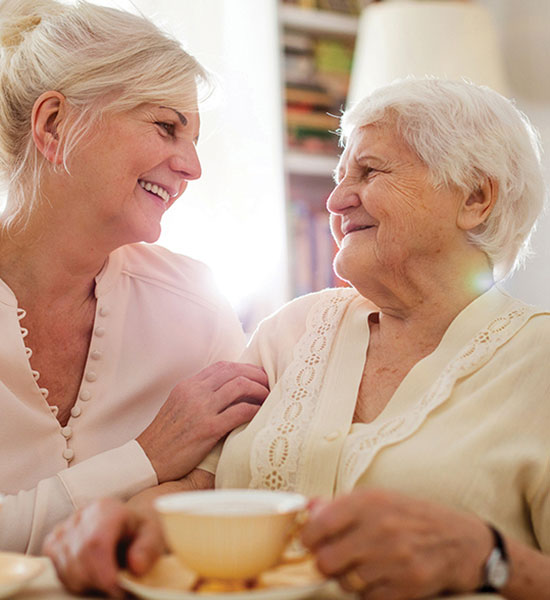 Two people having tea.