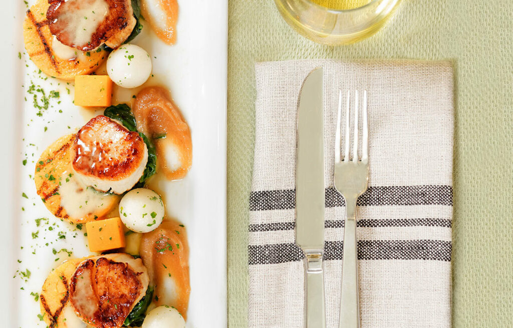 Sauteed scallops plated at McKnight Place